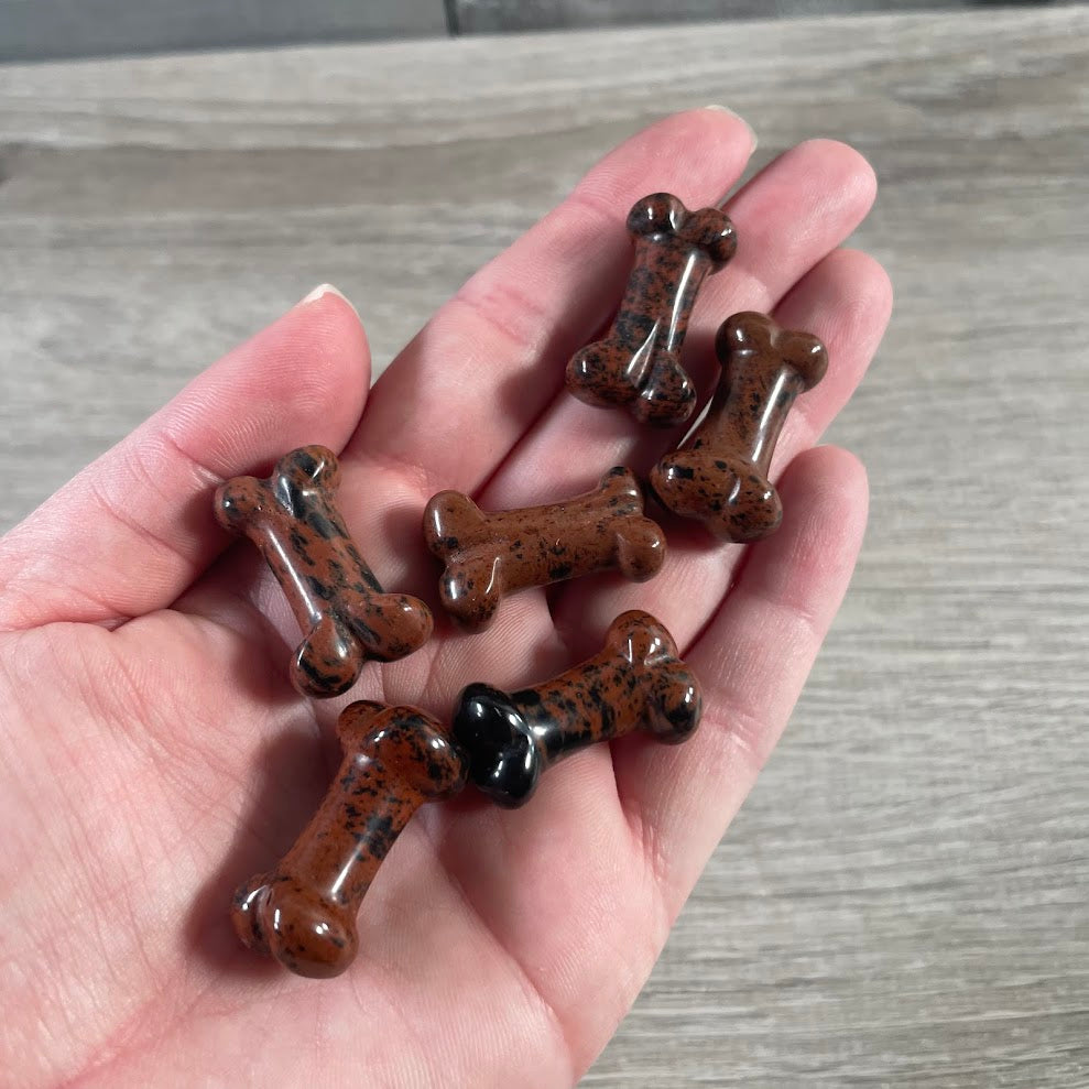 Mahoghany obsidian dog bone figurine
