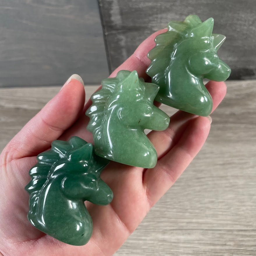 Aventurine carved gemstone unicorn head statue for crystal collections and gift shops
