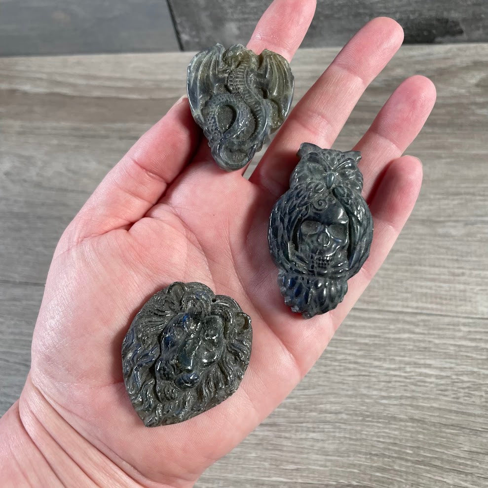 Assorted carved labradorite figurines for crystal shops and metaphysical retailers