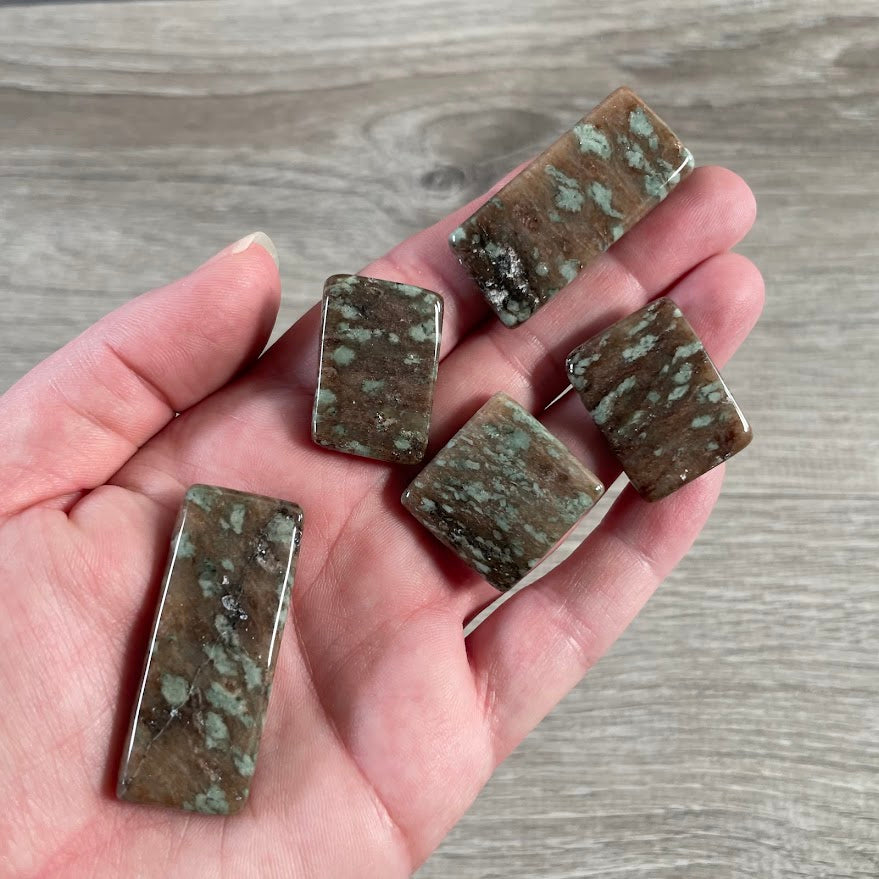 Wholesale Nundoorite crystal slab with natural mineral texture and color variation
