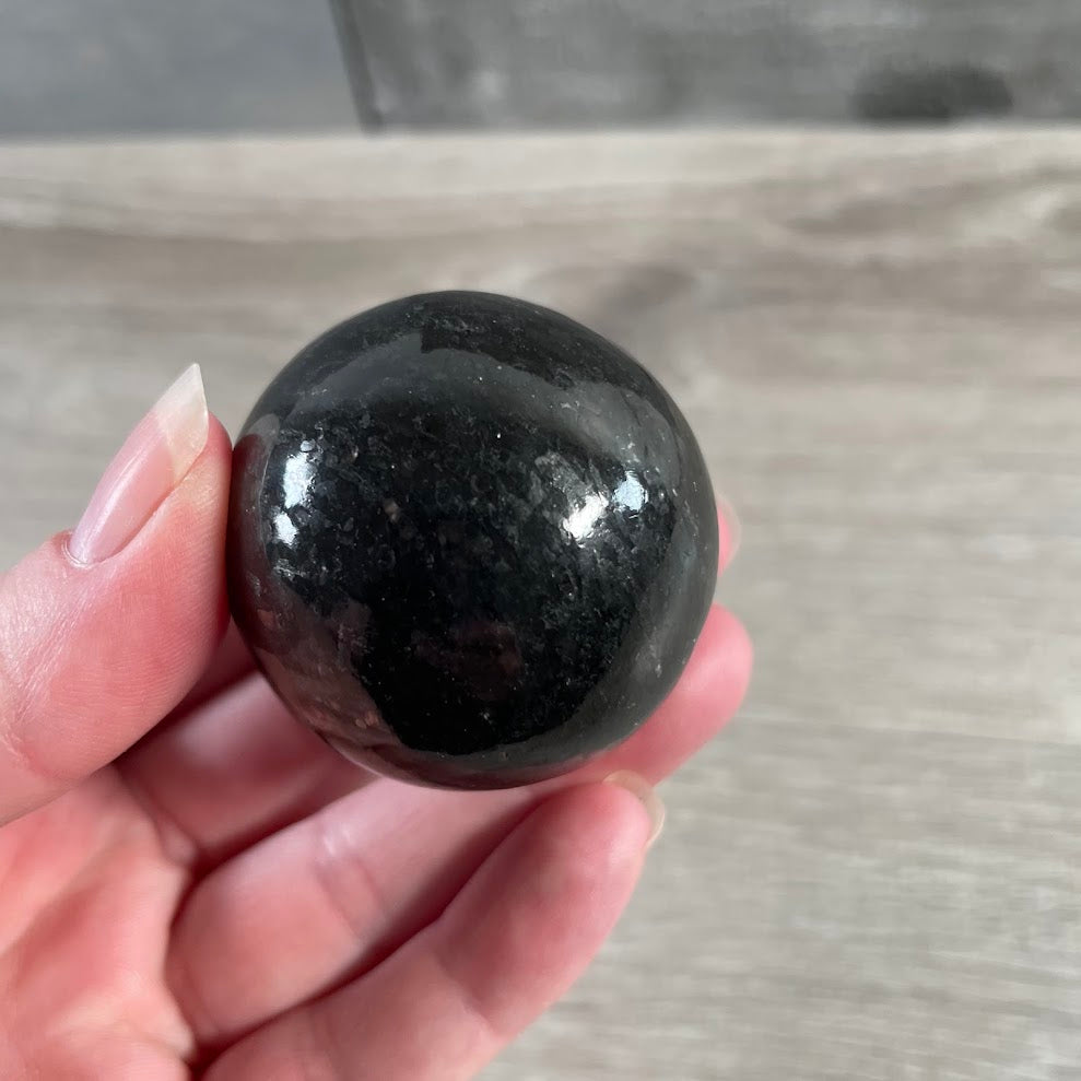 Wholesale nuummite sphere for metaphysical stores and collectors