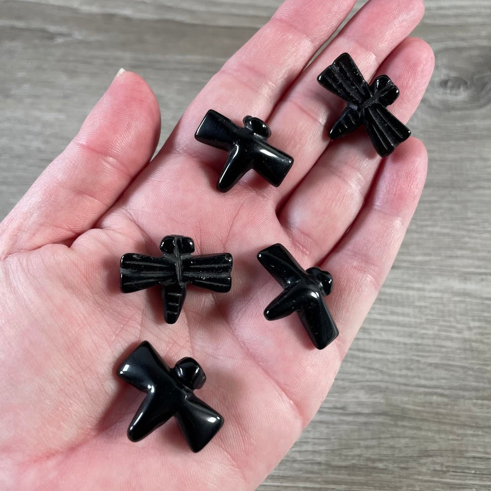 Obsidian crystal insect figurines shaped like dragonflies