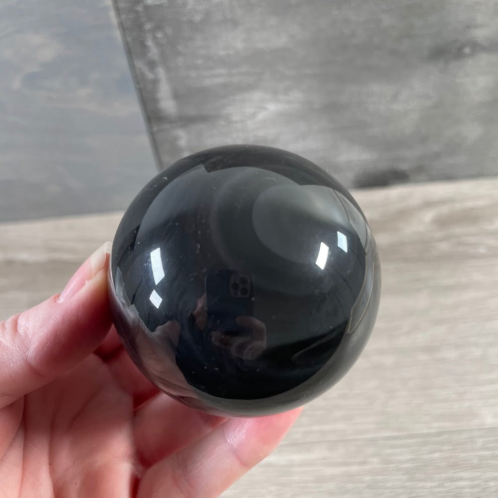 Wholesale Tri-Flo Obsidian sphere for metaphysical stores and crystal retailers