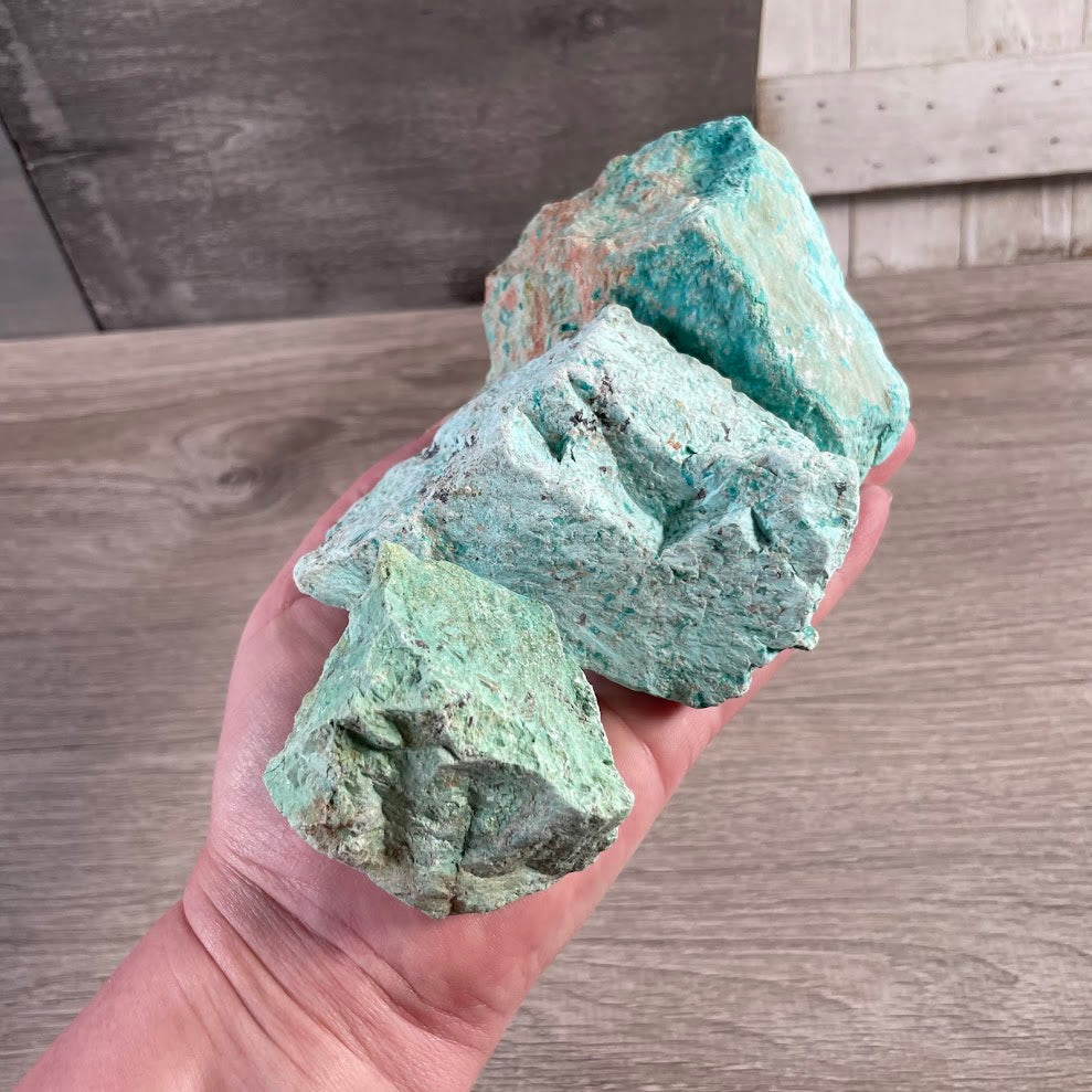 Wholesale raw chrysocolla stones with earthy matrix and natural gemstone texture