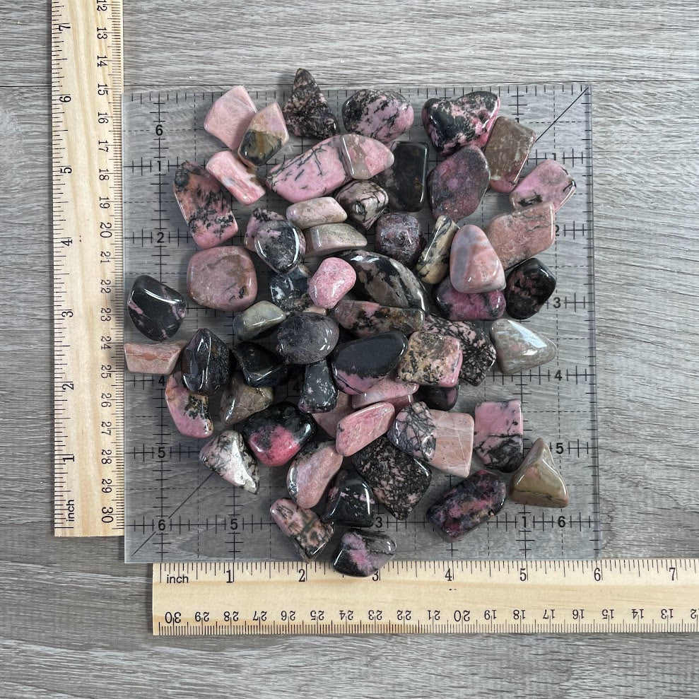 One pound lot of natural rhodonite tumbled stones for retail displays