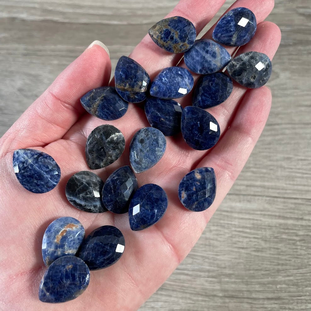 Sodalite small polished gemstone cabochons for wholesale jewelry supply displays