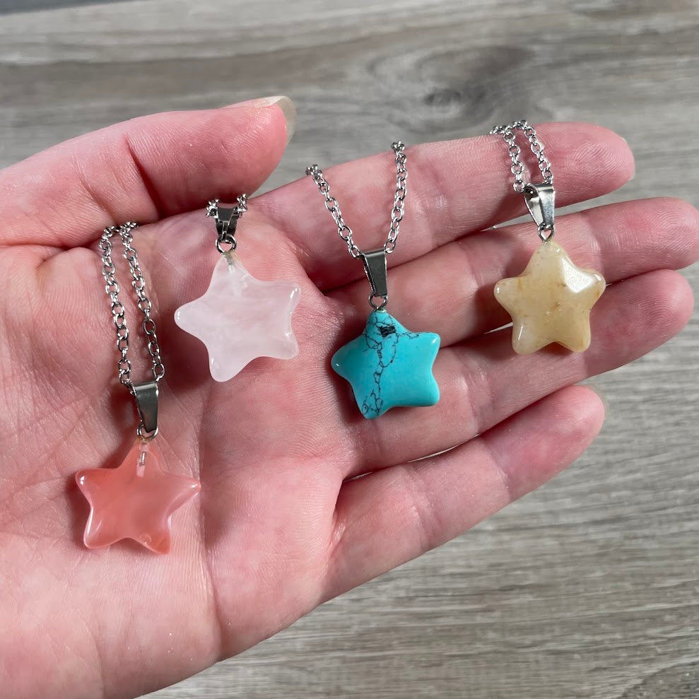 Star shaped gemstone pendant necklace with polished crystal stone and stainless steel chain