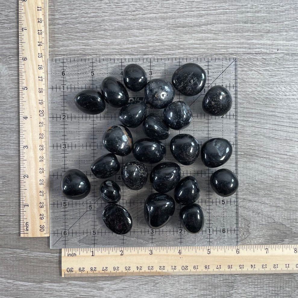Polished black tourmaline pocket stones for Reiki, meditation, and energy work