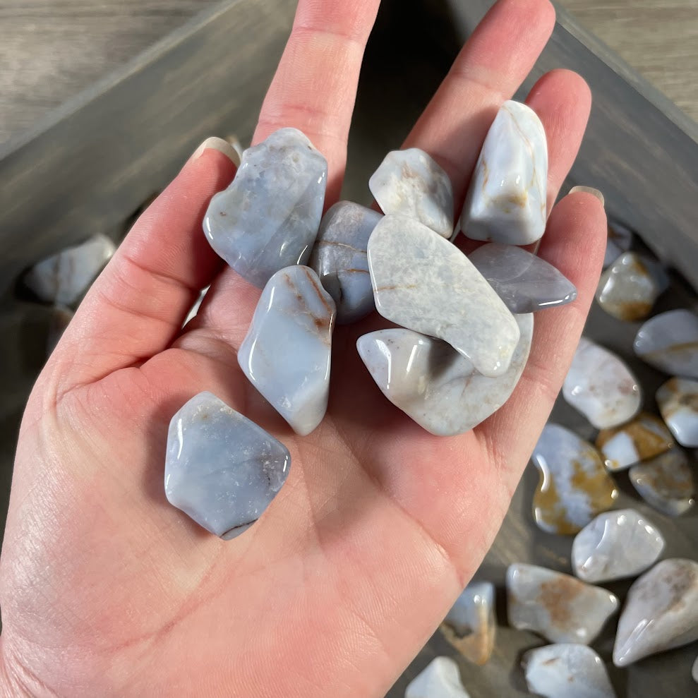 Bulk tumbled chalcedony crystals for metaphysical stores and crystal displays