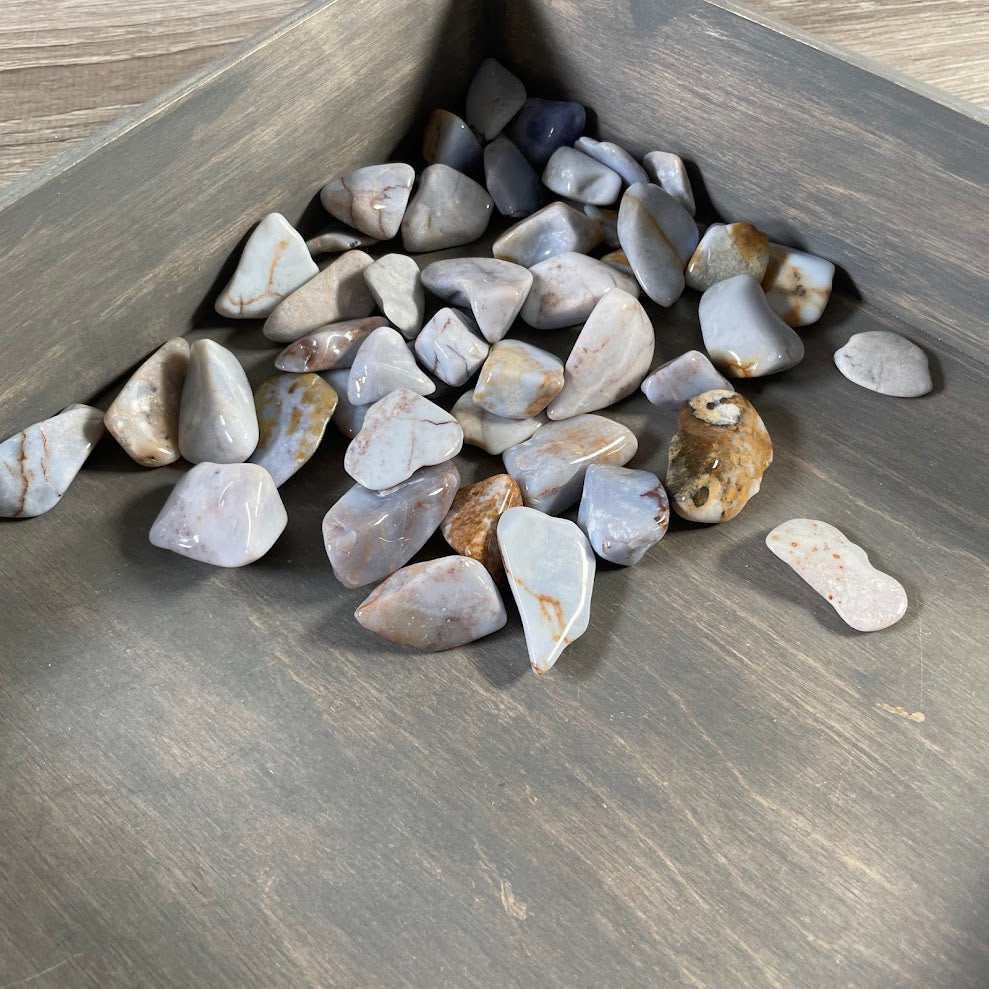 One pound lot of polished chalcedony stones for crystal shop inventory