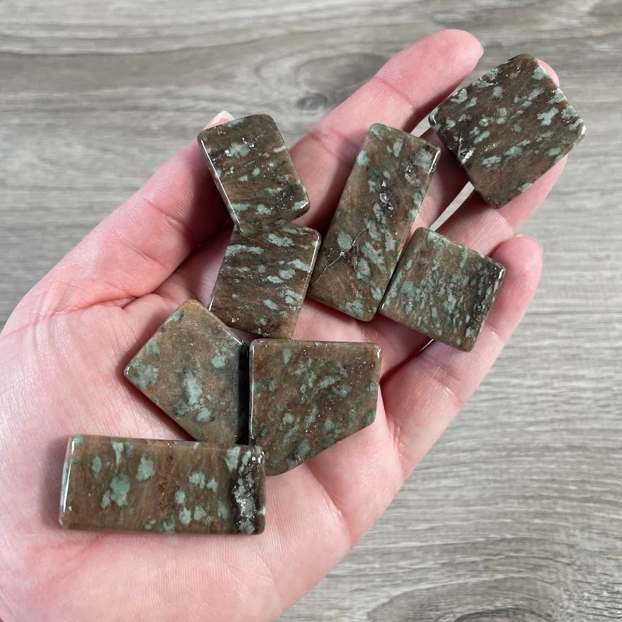 Nundoorite polished flat slab with natural green and brown mineral patterning