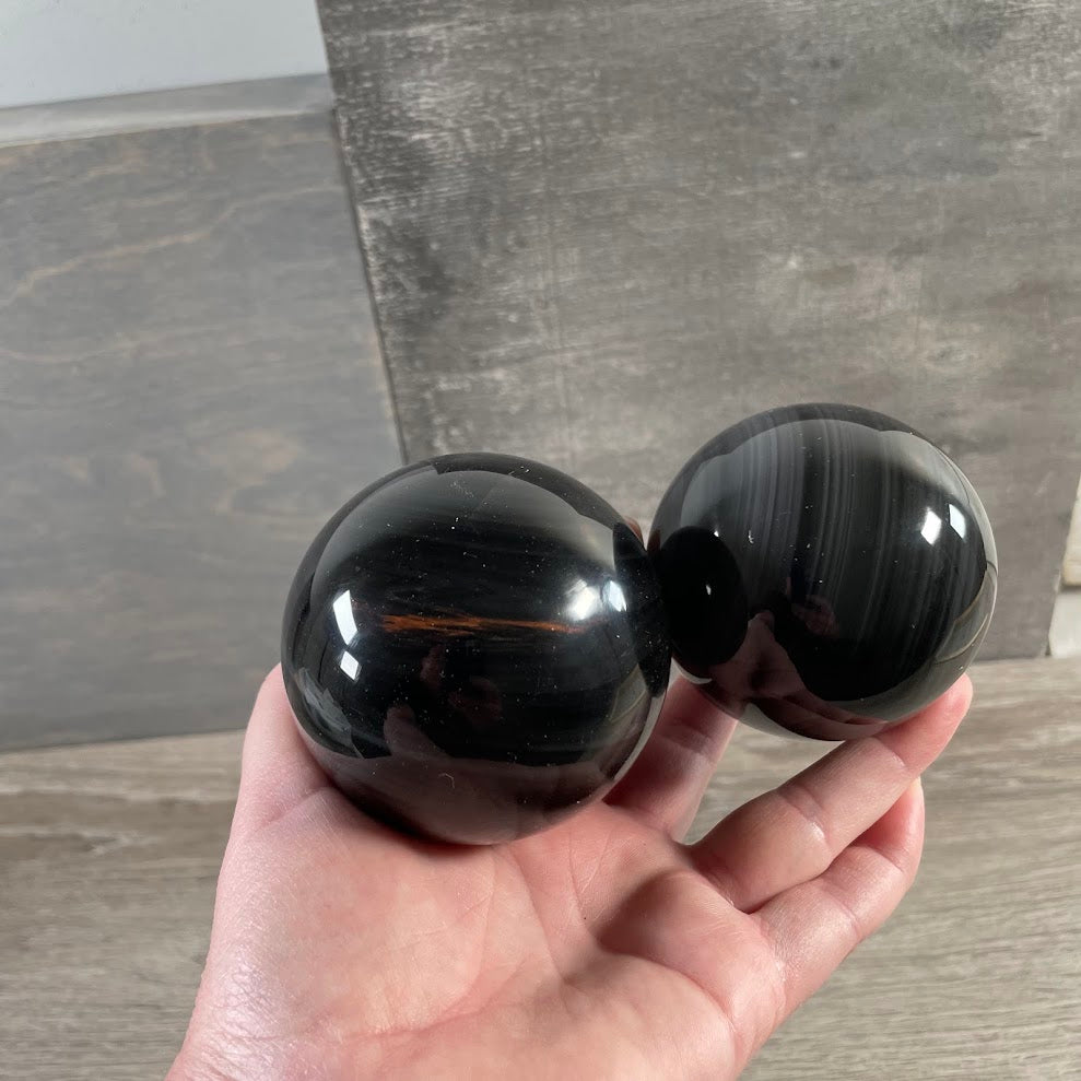 Black obsidian crystal sphere for Reiki, meditation, altar décor, and display