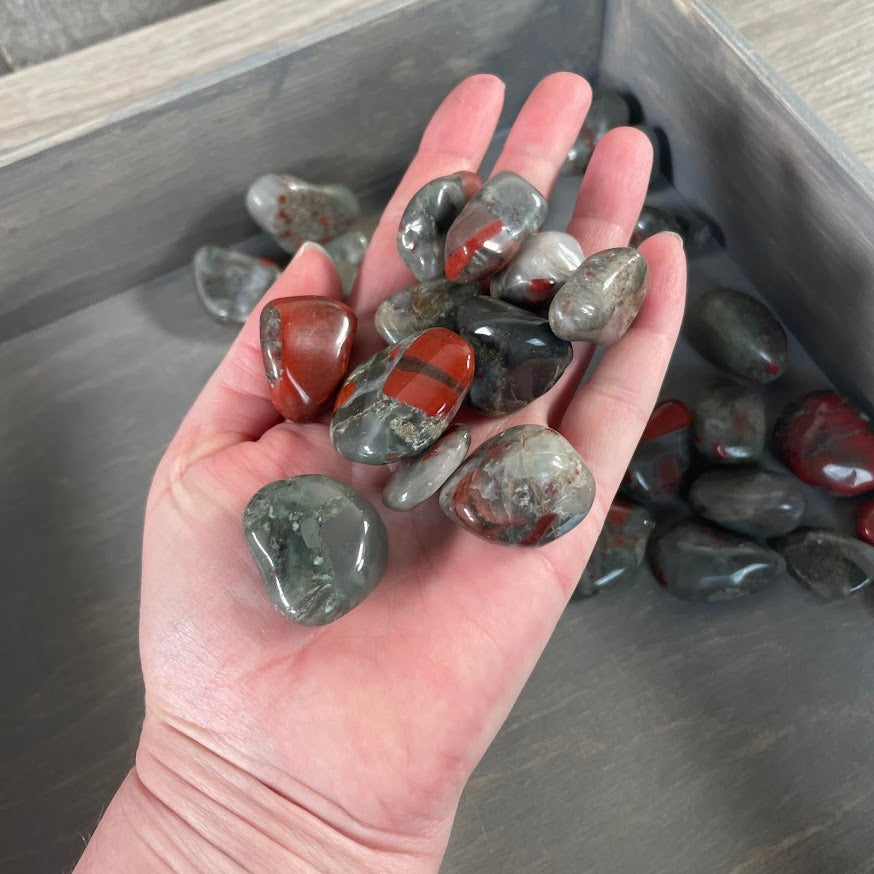 Polished African Bloodstone tumbled stones with natural green red brown and gray coloring