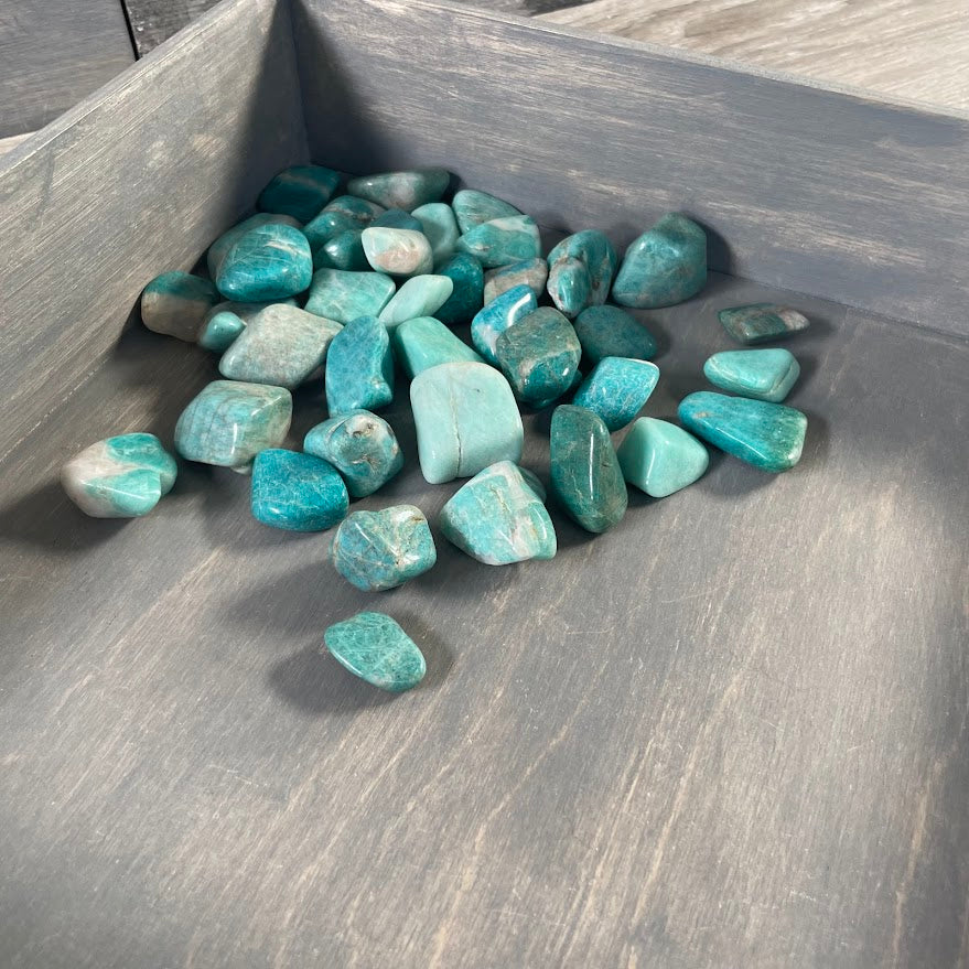 Wholesale Amazonite polished gemstones featuring natural turquoise-green colors and unique white mineral patterns