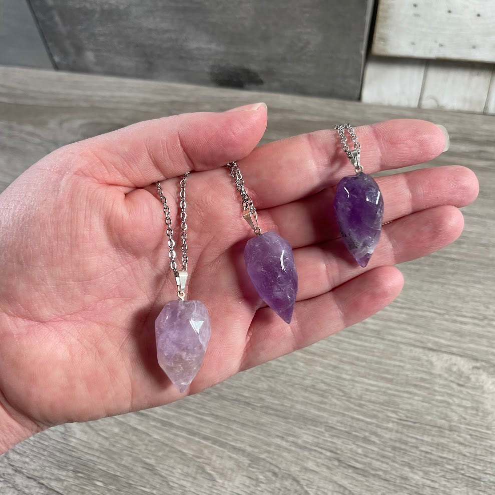 Faceted amethyst flame crystal pendant necklace with polished gemstone and stainless steel chain