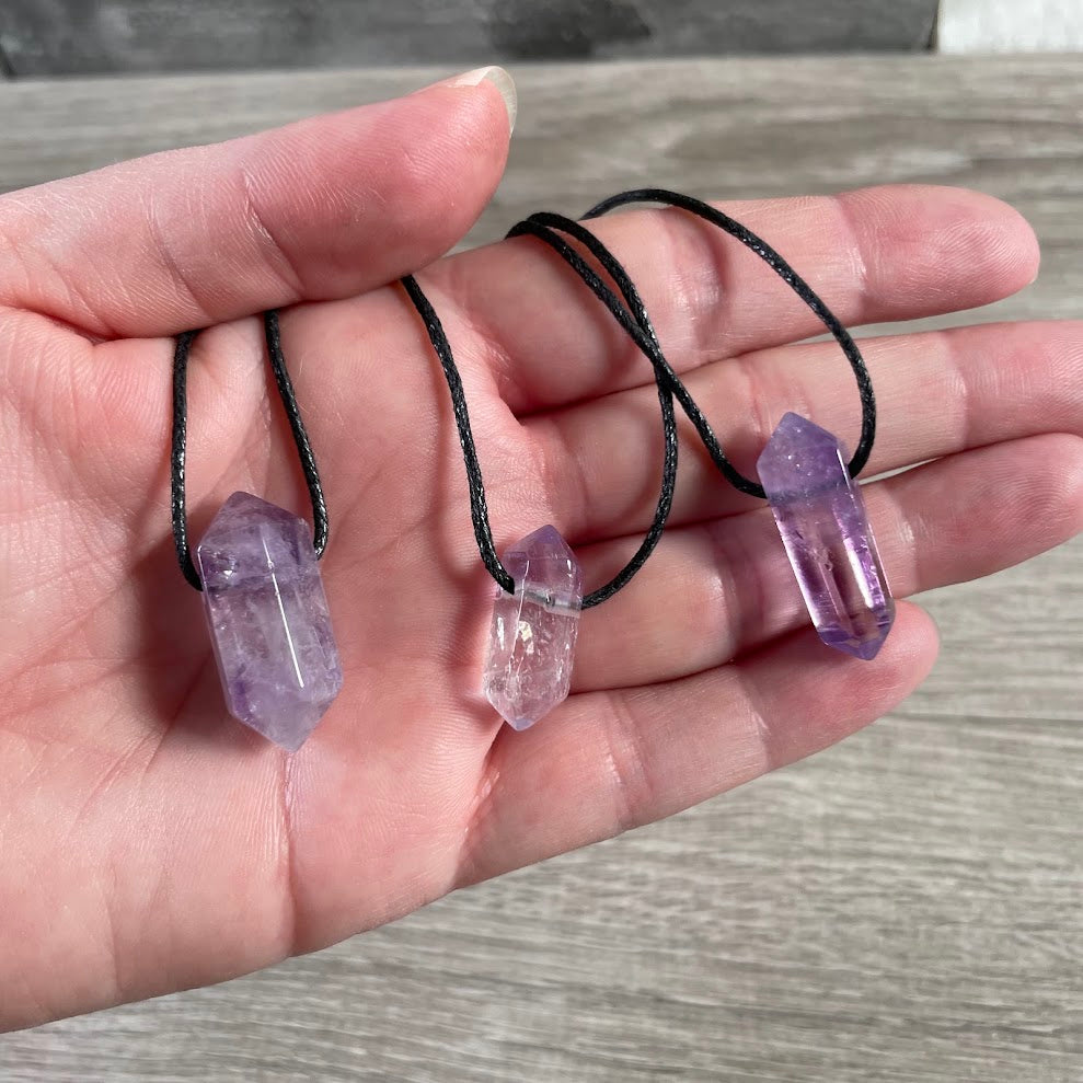 amethyst men's gemstone pendant necklace with polished double terminated crystal point