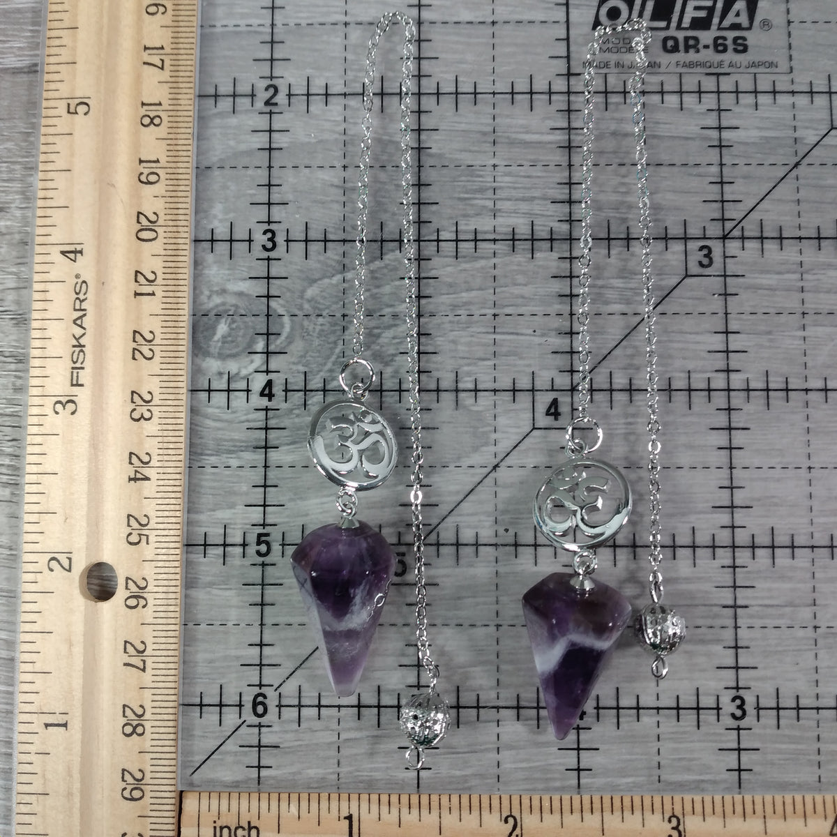 Wholesale Ohm symbol pendulum for crystal shops and meditation supplies
