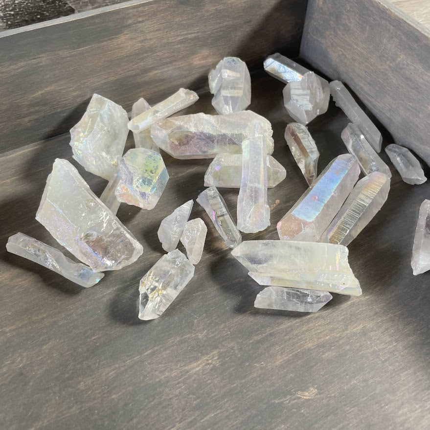 Bulk Angel Aura Quartz crystal points with iridescent rainbow coating for wholesale retailers