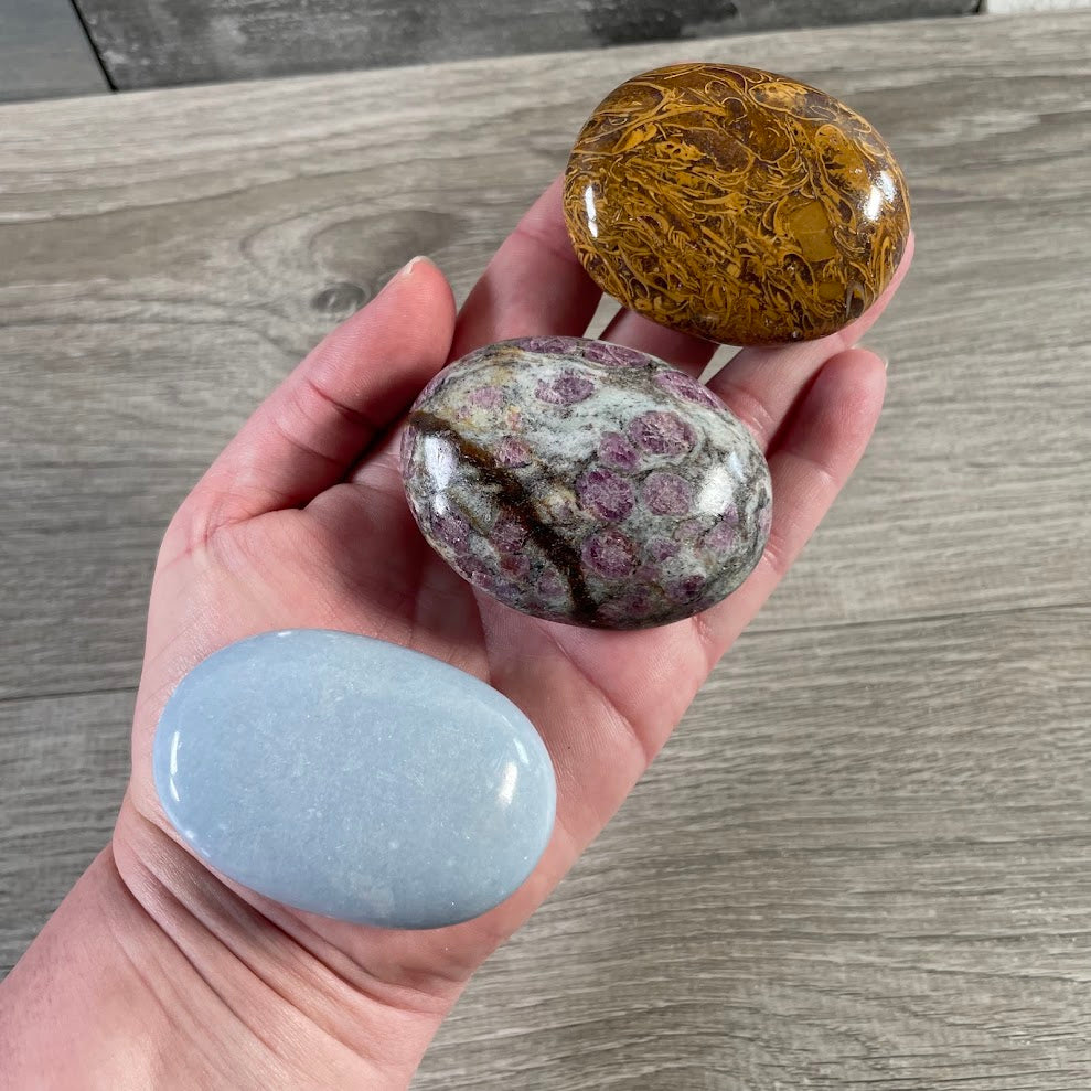 Assorted polished gemstone pocket stones wholesale palm stone collection