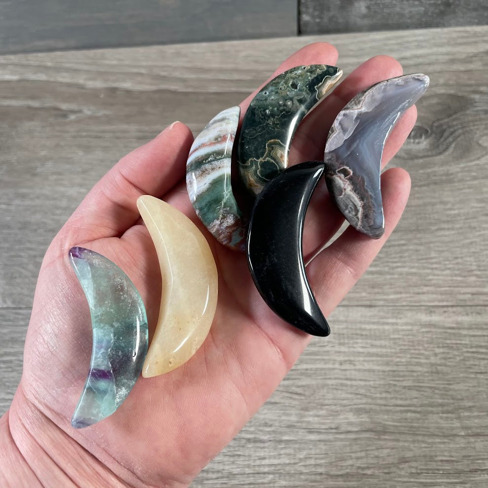 Wholesale crystal crescent moon carvings in assorted gemstone varieties