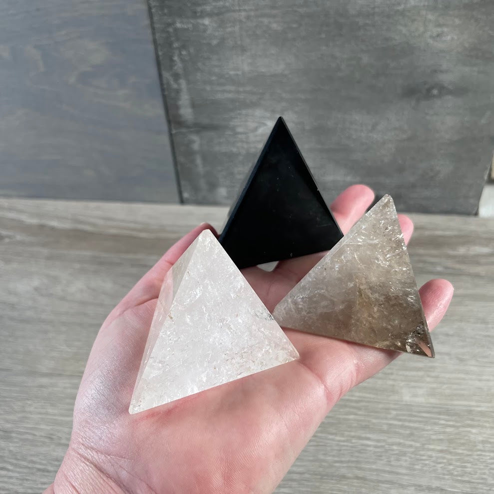 assorted polished tetrahedron crystal geometric natural gemstone carving