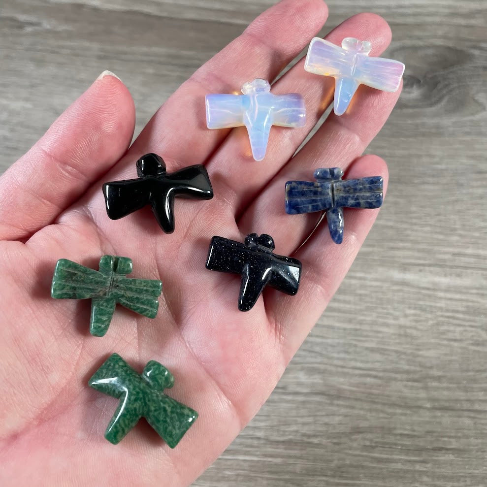 Assorted gemstone small dragonfly figurines carved from polished crystal