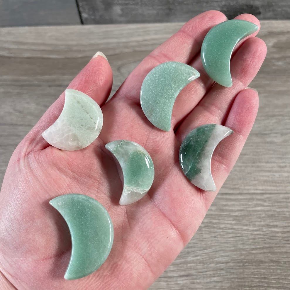 aventurine hand carved Brazilian gemstone moon showing its curved shape