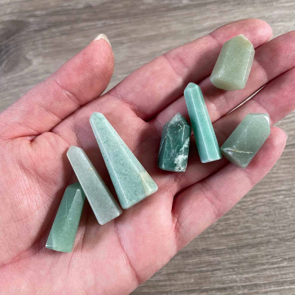 Small aventurine gemstone crystal tower from Brazil with handmade polished finish.