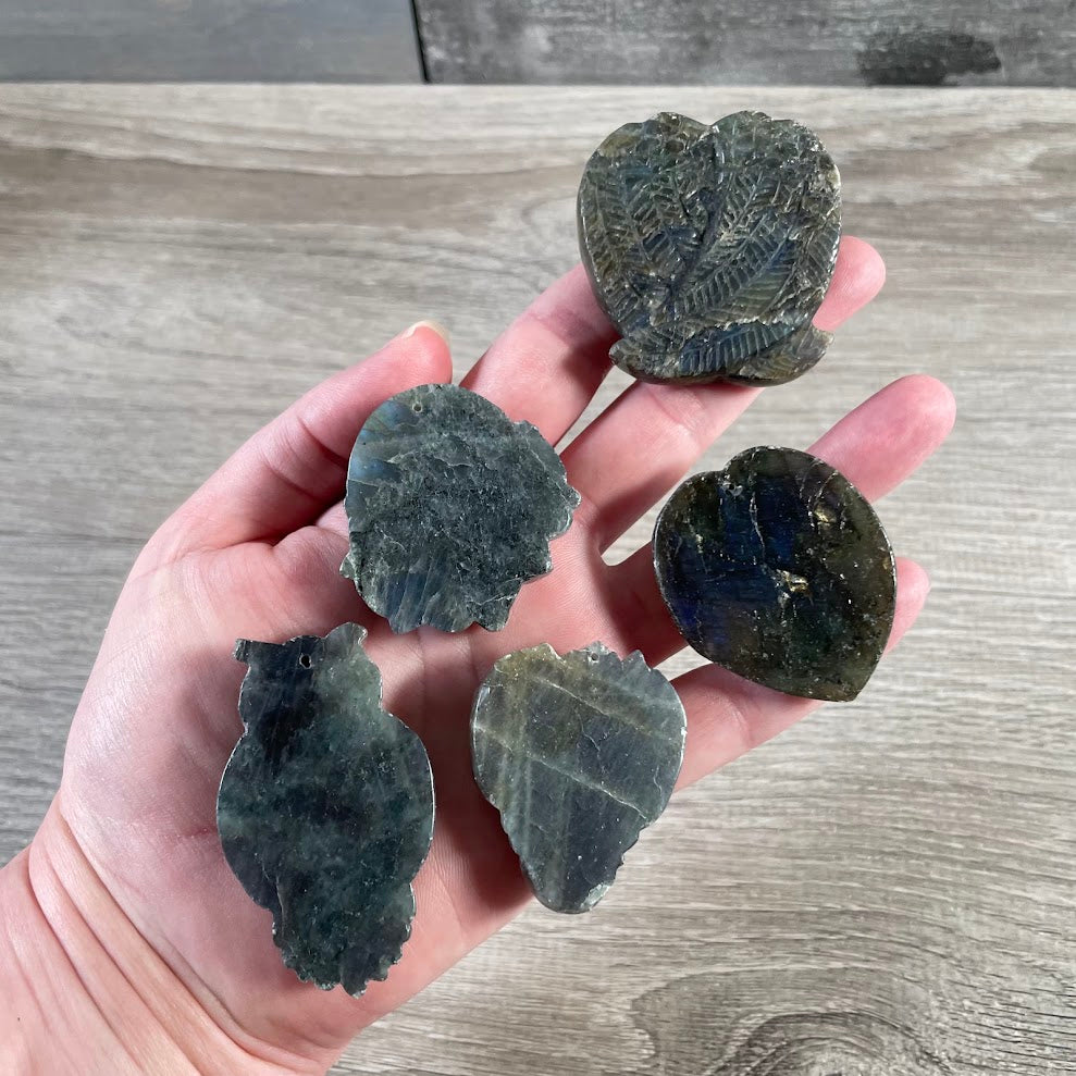 back side of assorted labradorite figurines