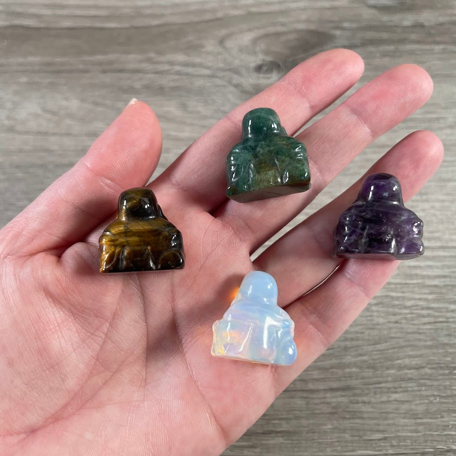 back side of small gemstone buddhas