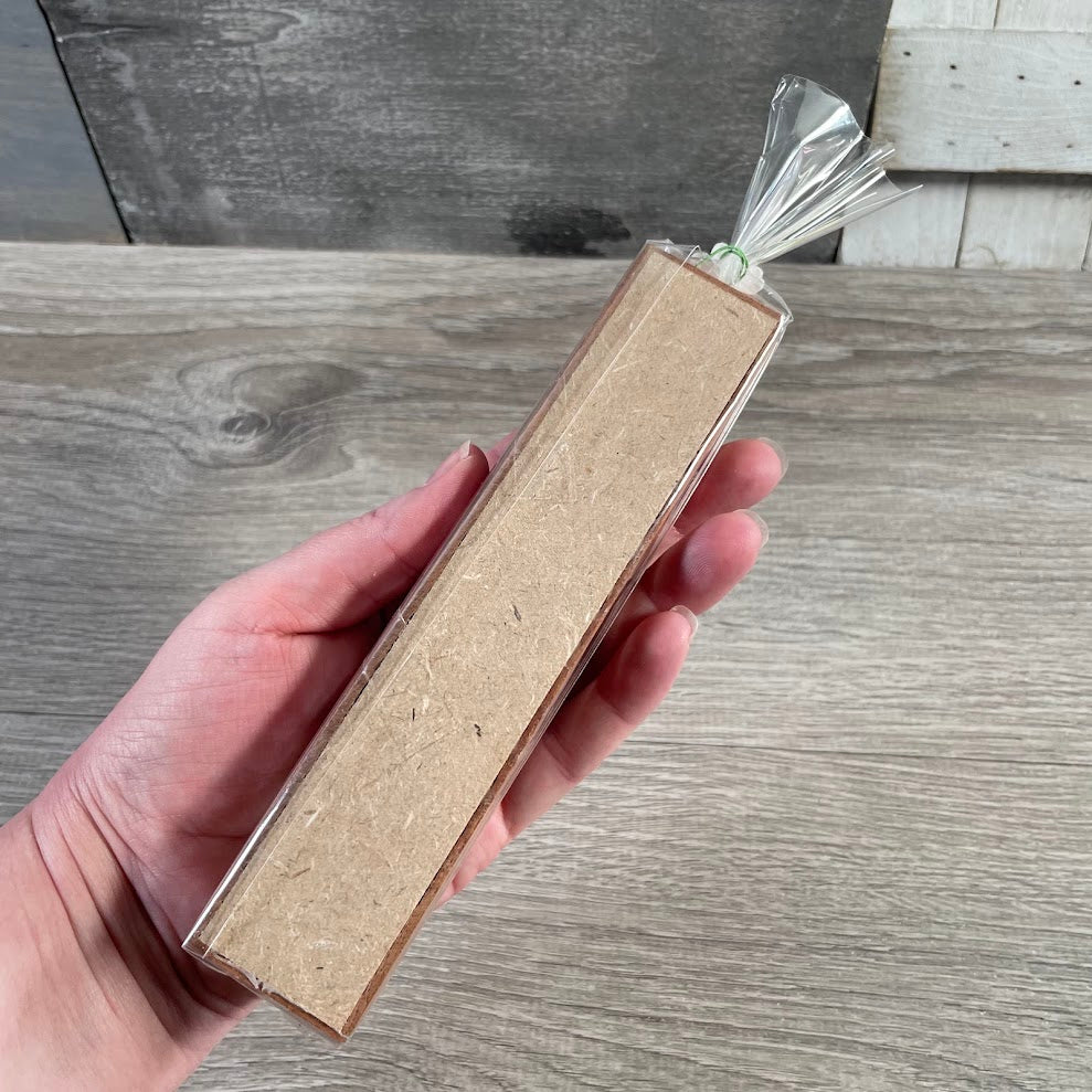 back side of packaging for elephant candles