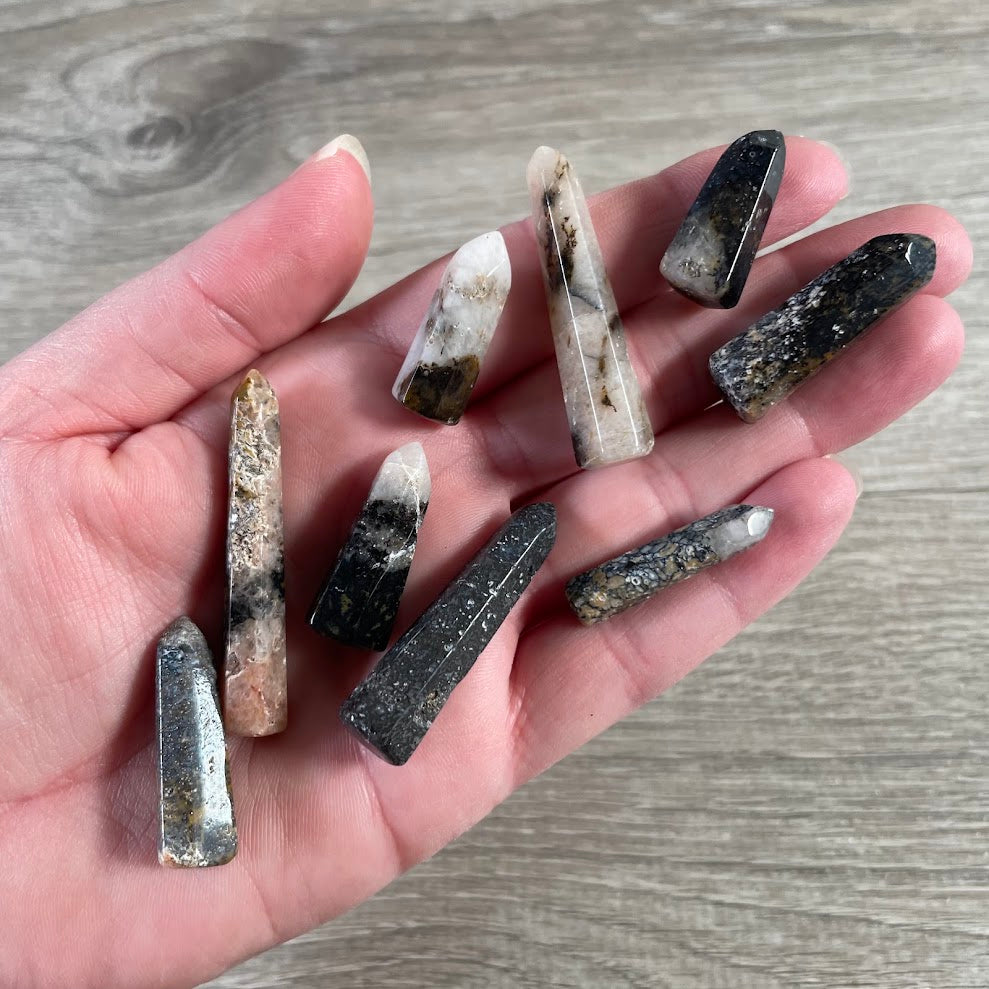 Handmade polished biotite gemstone tower from Brazil with unique natural stone variations.