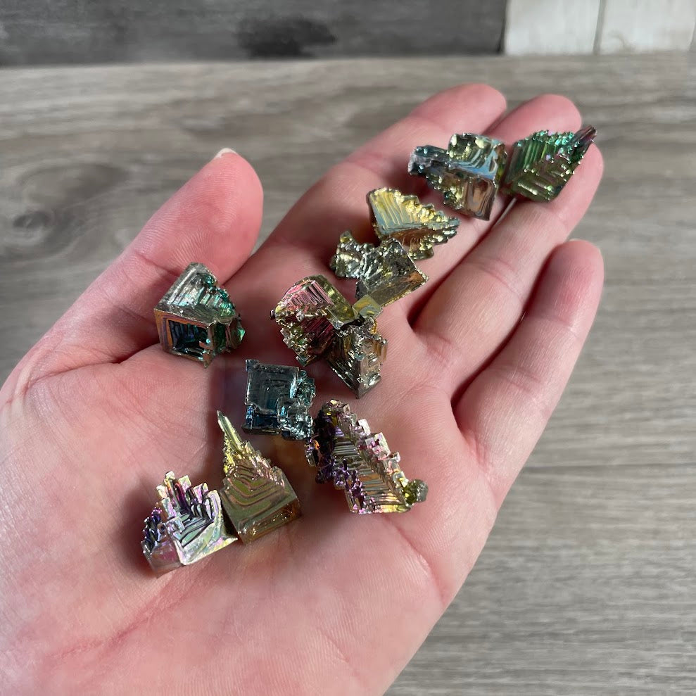 Lab grown bismuth crystal specimen with rainbow metallic colors for wholesale resale