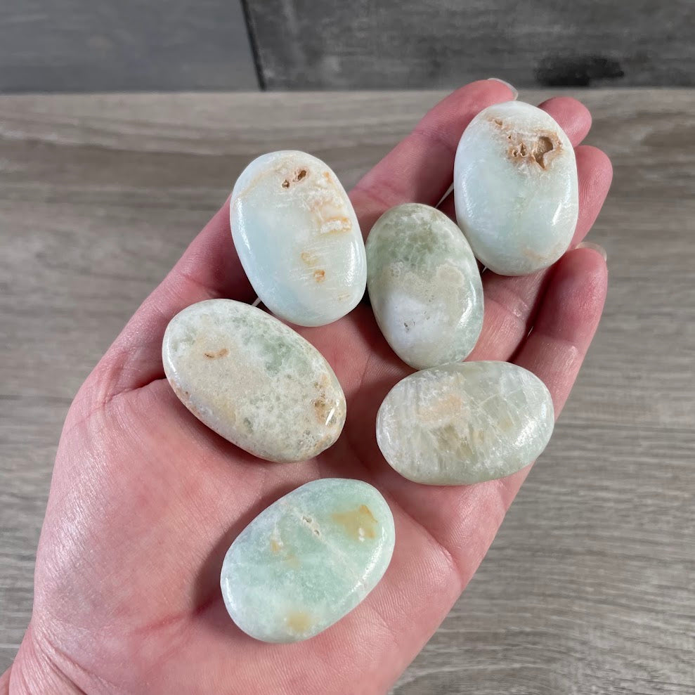 Blue calcite wholesale Afghanistan gemstone palm stones for crystal shops