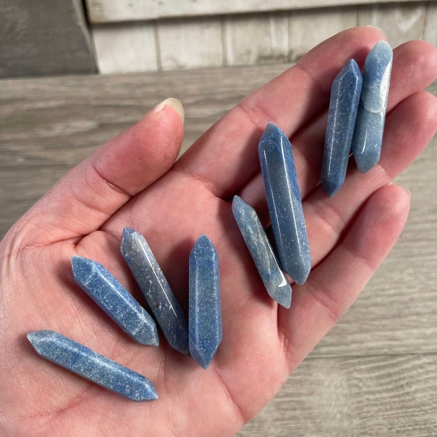 Small polished blue quartz Brazilian crystal points with double terminated ends for gemstone and metaphysical shop