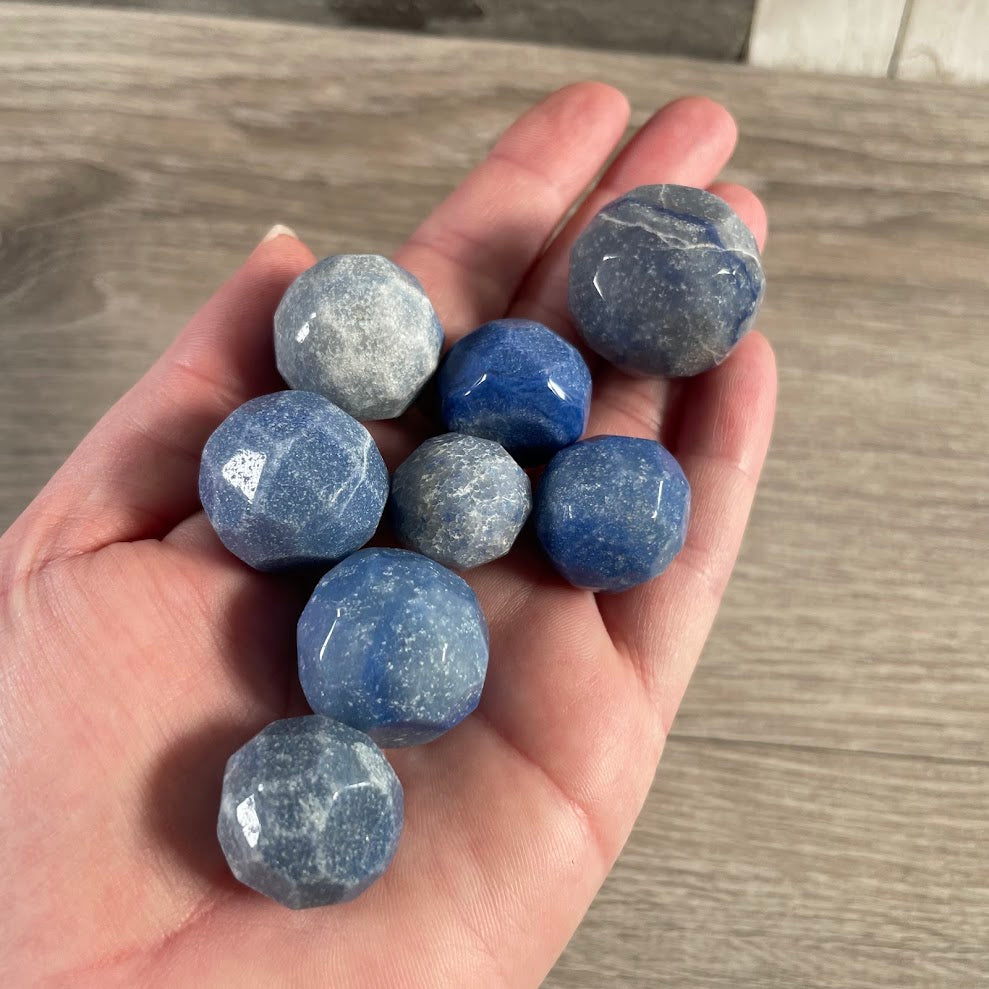 blue quartz polished gemstone sphere crystal collectible with faceted surface for gift shops