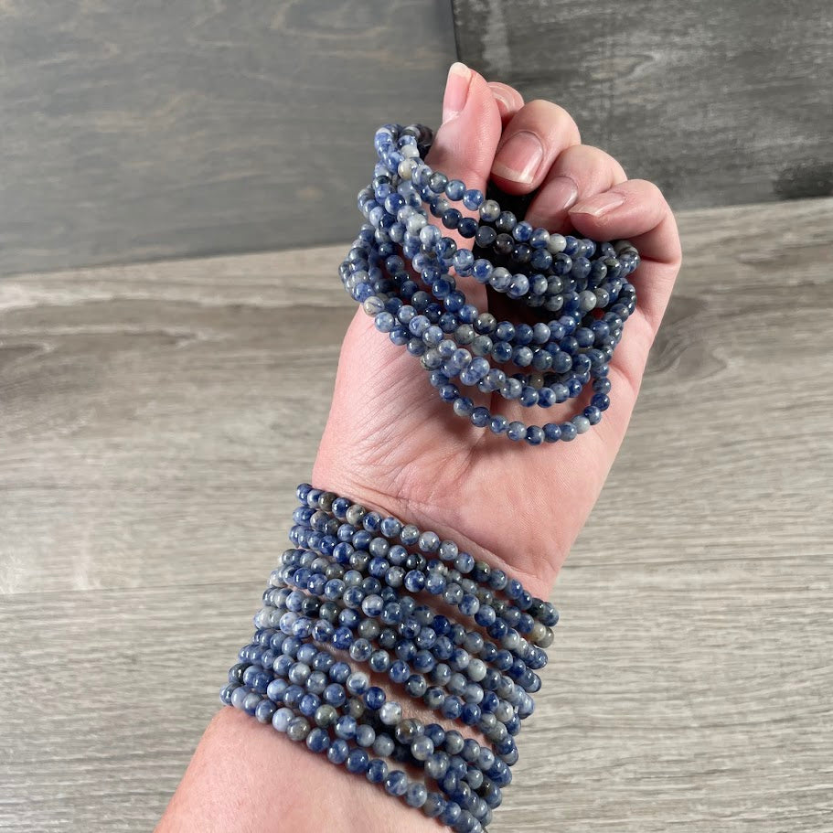 blue spot polished crystal bead bracelet with natural gemstone beads