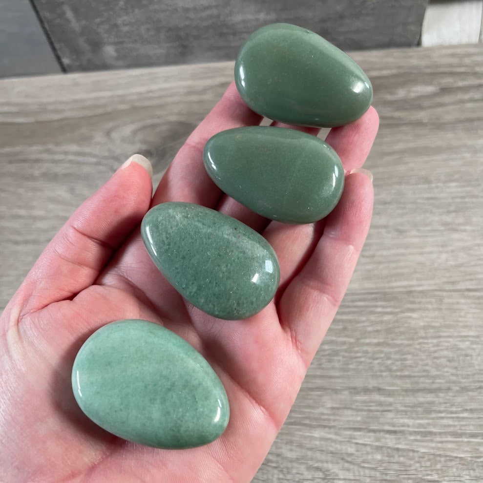 Polished green crystal pocket stones for gift shops
