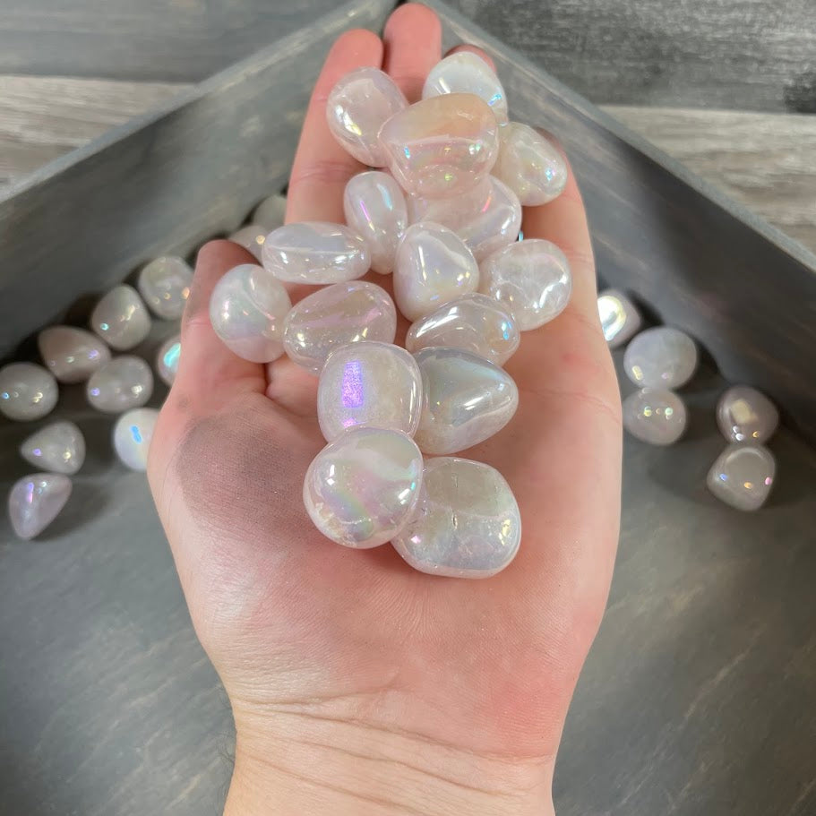Polished rose aura gemstone assortment with pink iridescent finish