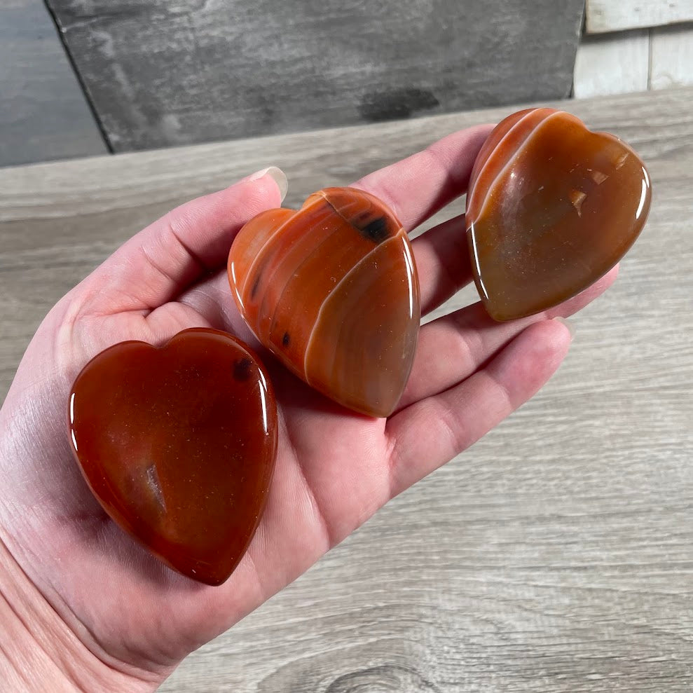 carnelian polished crystal heart pocket stone for metaphysical stores