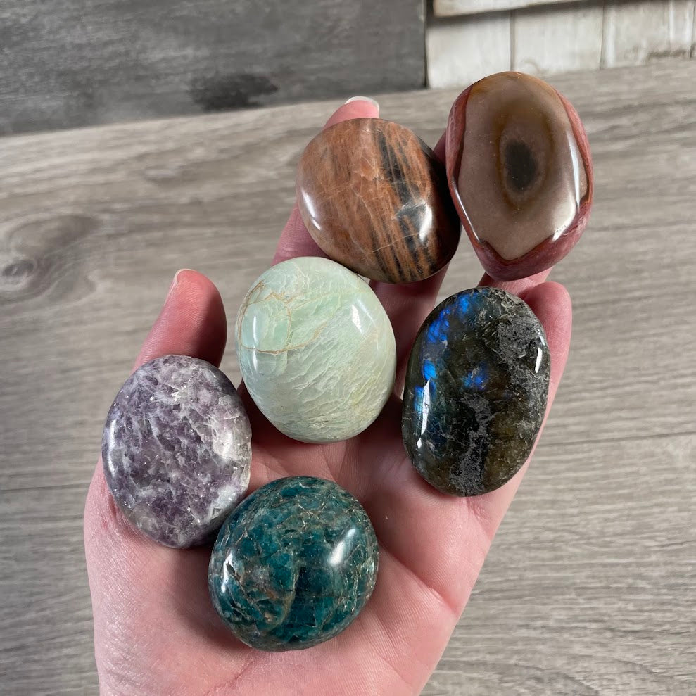 Mixed natural gemstone palm stones for wholesale crystal and mineral shop inventory