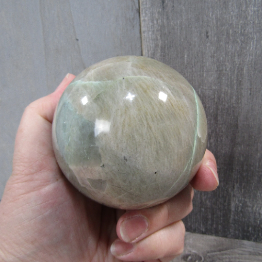 Moonstone garnierite sphere, large size with vibrant green tones, for crystal healing and decor