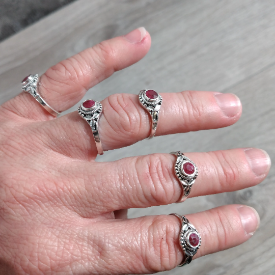  Sterling Silver ring with Hippie Leaf band and ruby center stone