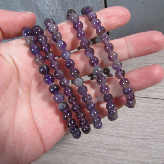 Stretchy bracelet made from 6mm round amethyst beads