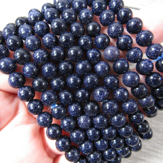 Stretchy bracelet made from 6mm round blue goldstone beads