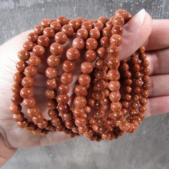 Stretchy bracelet made from 6mm round goldstone beads