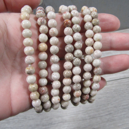 Stretchy bracelet made from 6mm round maifanite beads