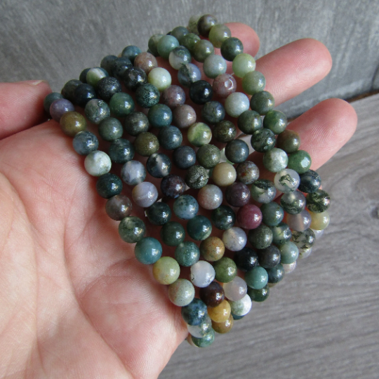 Stretchy bracelet made from 6mm round moss agate beads