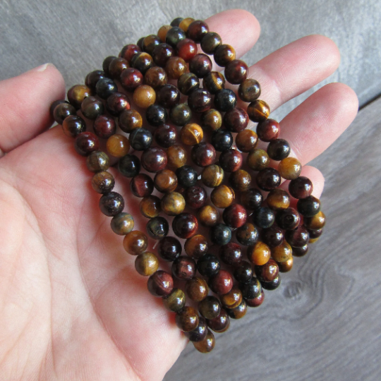 Stretchy bracelet made from 6mm round multi tiger eye beads