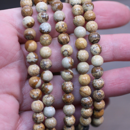 Stretchy bracelet made from 6mm round picture jasper beads